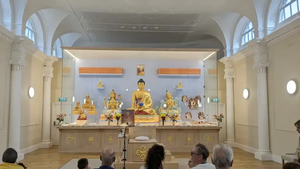 Buddhist shrine and statues at Kadampa Meditation Centre Leeds