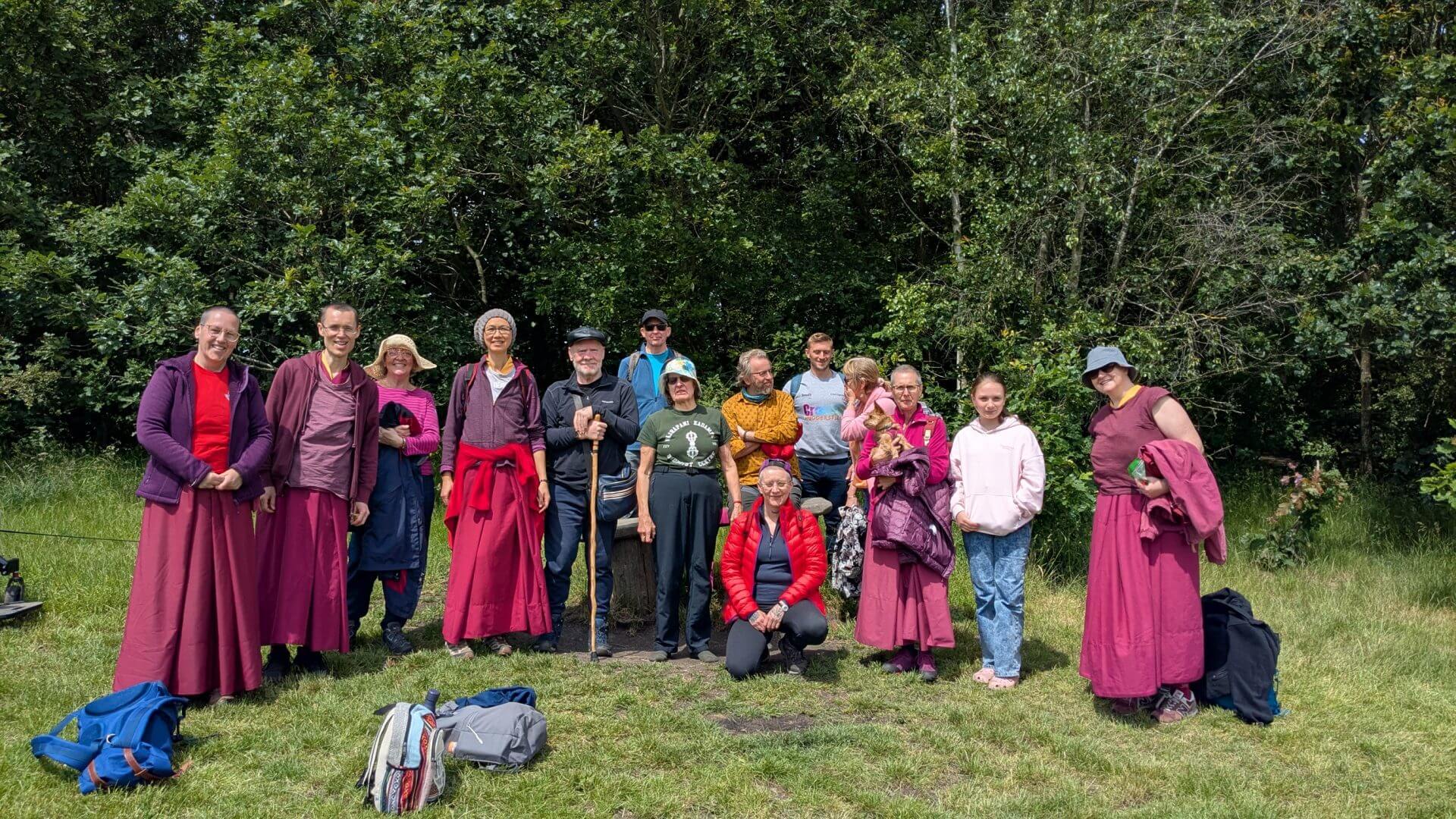 a community of people from Vajrapani Centre enjoying a walk in the park togeter