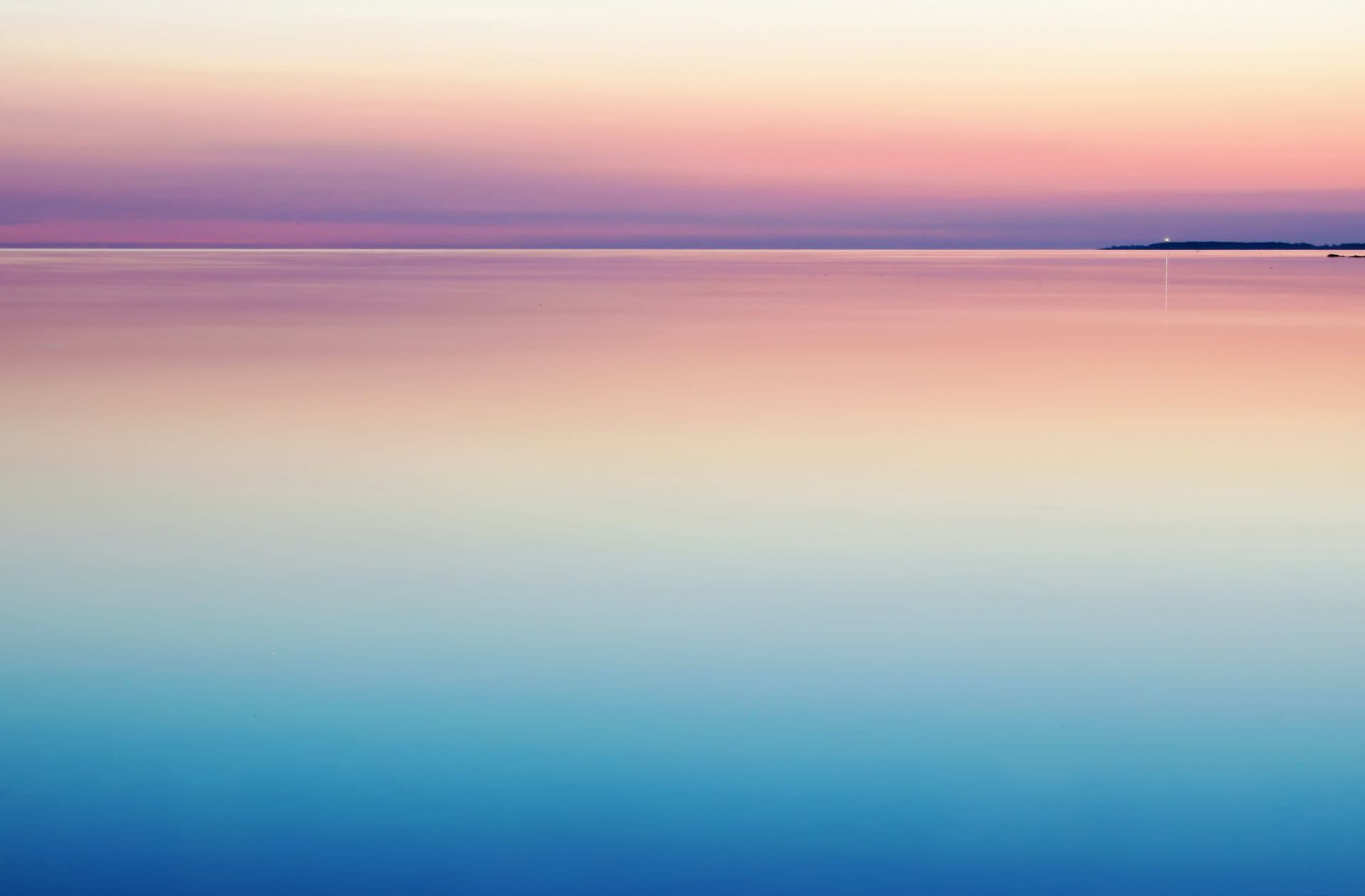 a calm sea with clear sky